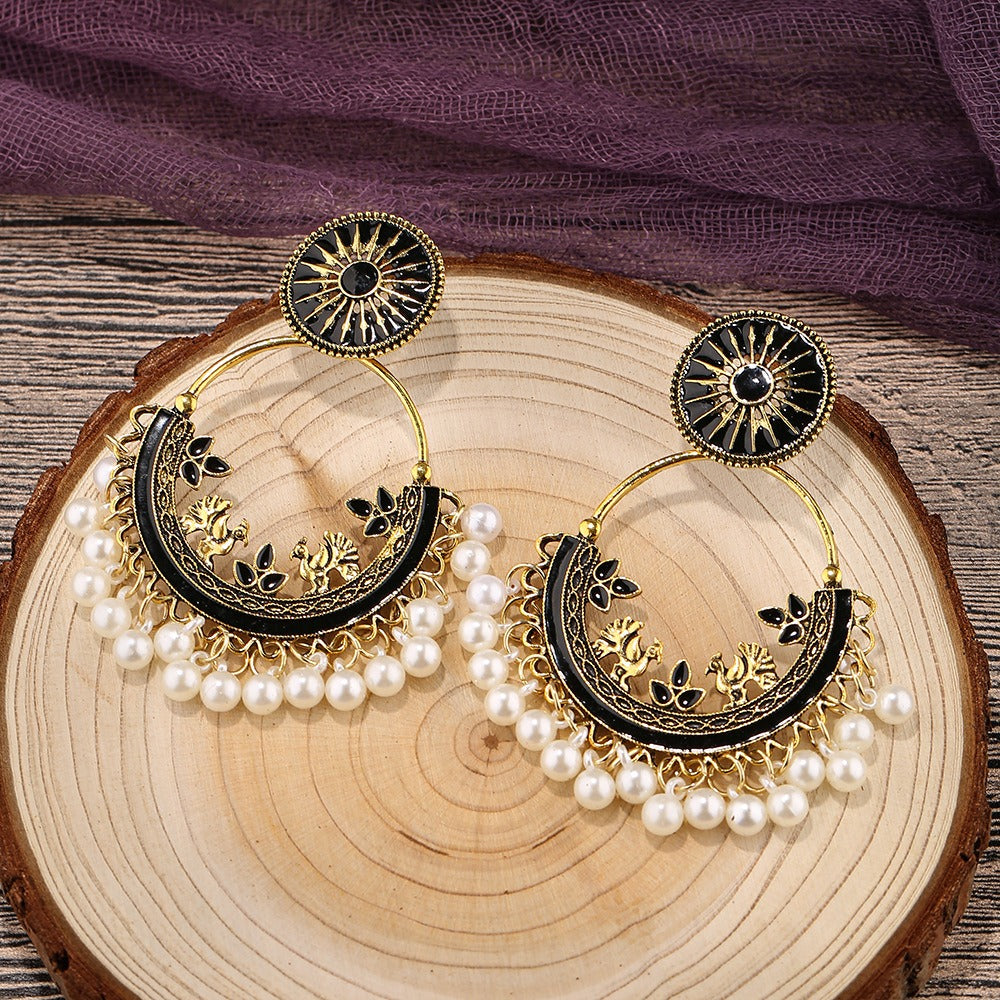 Moon alloy earrings jewelry exaggerated retro Indian style hollowed out bell pendant design sense earrings jewelry