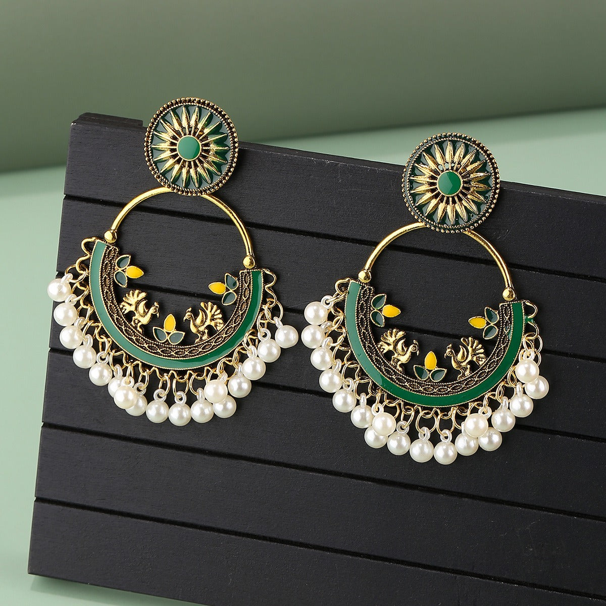 Moon alloy earrings jewelry exaggerated retro Indian style hollowed out bell pendant design sense earrings jewelry